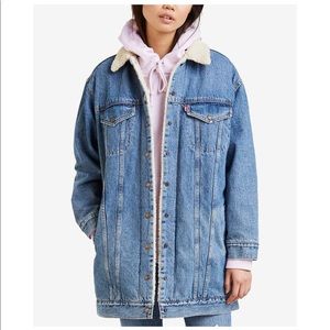 Levi’s long sherpa-lined trucker jean jacket